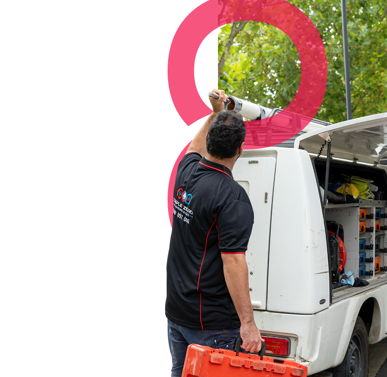 Emergency plumber at service vehicle